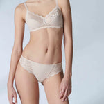 Front view of the wireless Caresse bra in blush tone—The Foundation