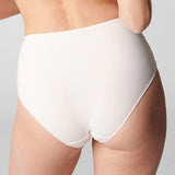 Back view of Simone Perele Delice Brief in blush showing full bottom coverage and tulle detail.