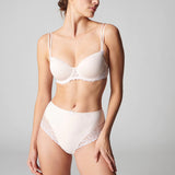 Full body shot of model in Simone Perele Delice Culotte Brief blush – styled with matching bra.