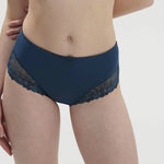Model wearing Delice Culotte Brief in Prestige Blue – detailed Guipure lace, flattering high cut, and full coverage.
