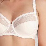 Close-up of Delice Control Full Cup Bra in blush showing embroidered detail and curve-enhancing shape.