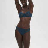 Simone Perele Delice Prestige Blue bra shown on model in joyful pose.