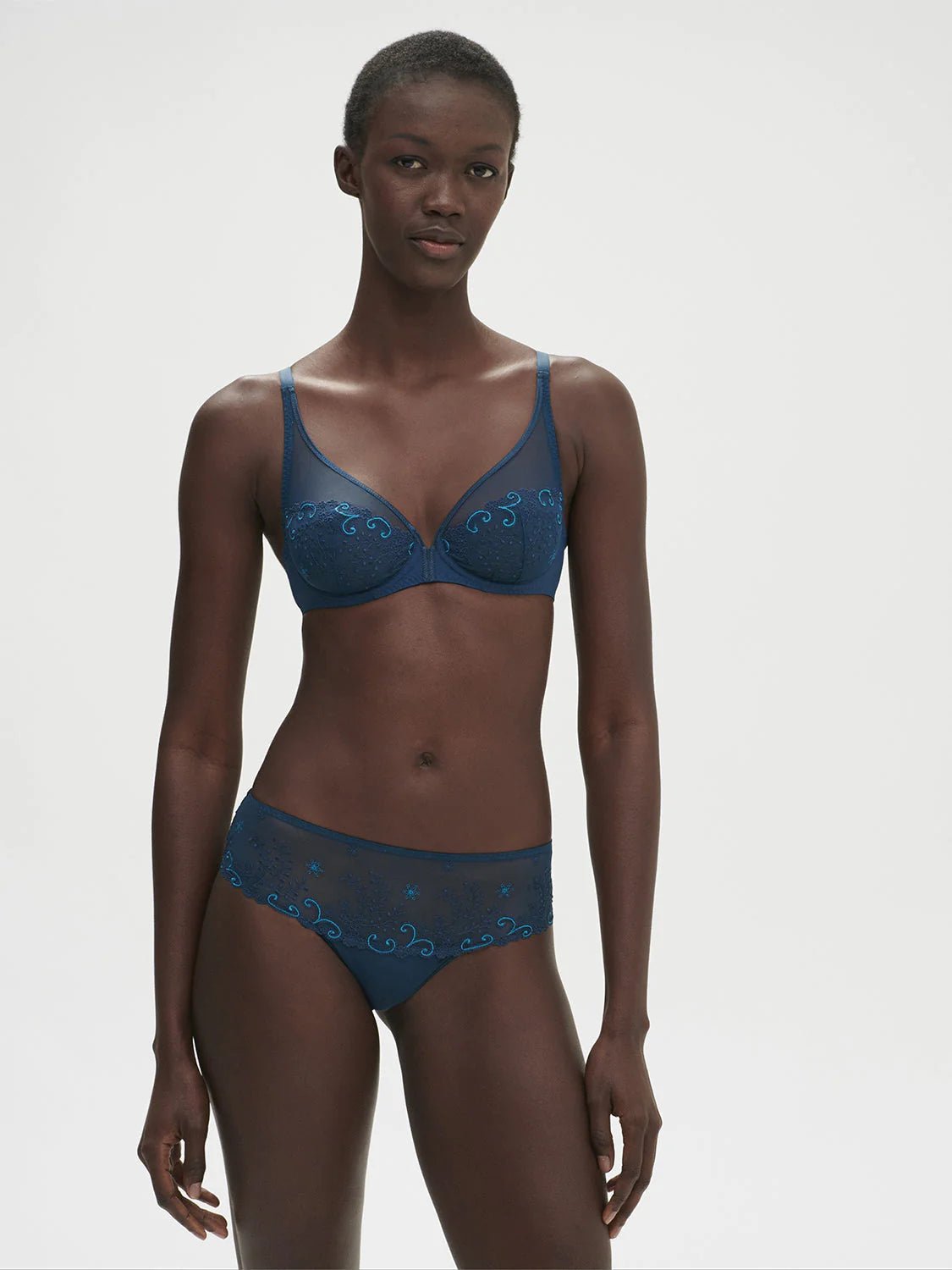 Simone Perele lingerie set featuring Delice Shorty Brief in Prestige Blue – mid-rise brief styled with coordinating bra.