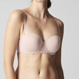 Model wearing Simone Perele Delice Strapless Bra in blush – elegant and modern lingerie option from The Foundation