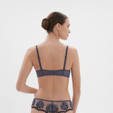 Back of Simone Perele Intrigue Half Cup Bra Cinder Blue, showing soft microfibre band and signature adjustable straps, found at The Foundation.