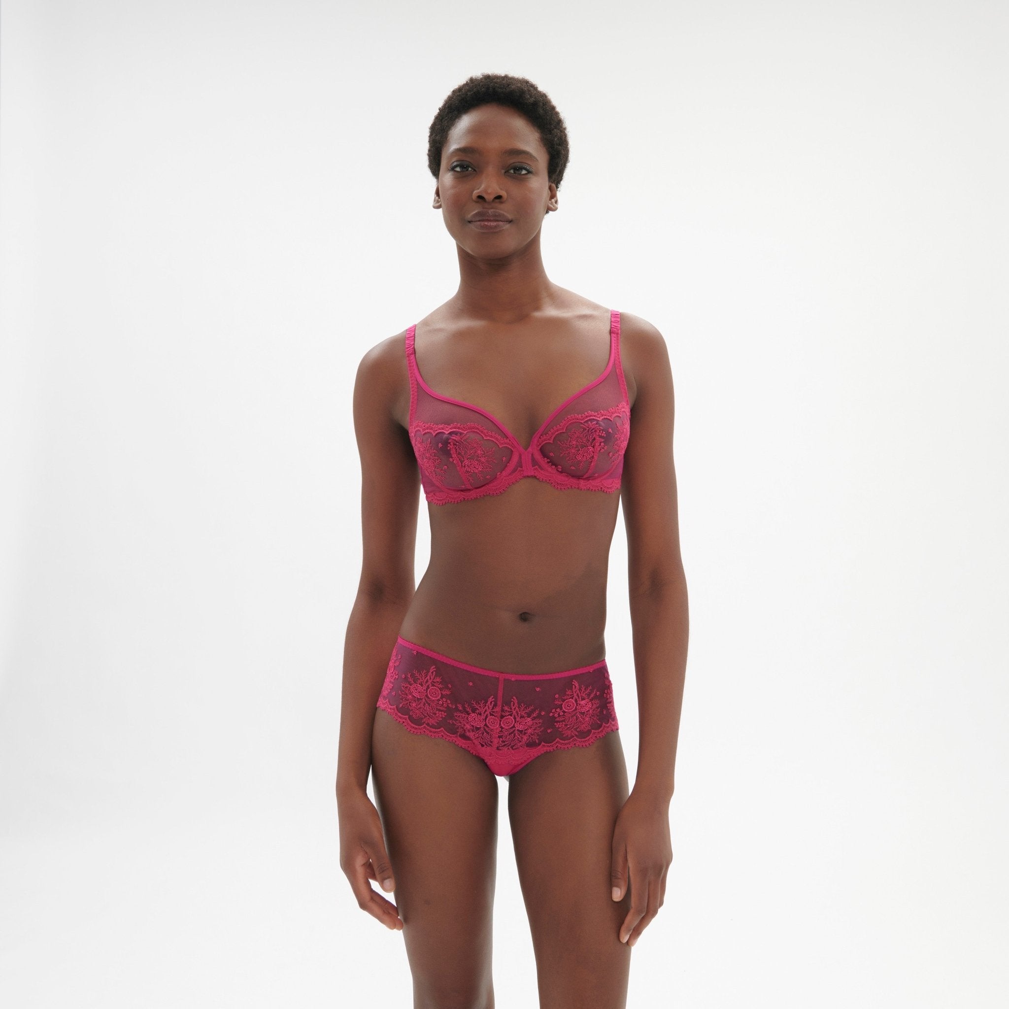 Model shown in matching set with Intrigue Shorty Brief Disco Pink by Simone Perele, showcasing contemporary couture style from The Foundation.