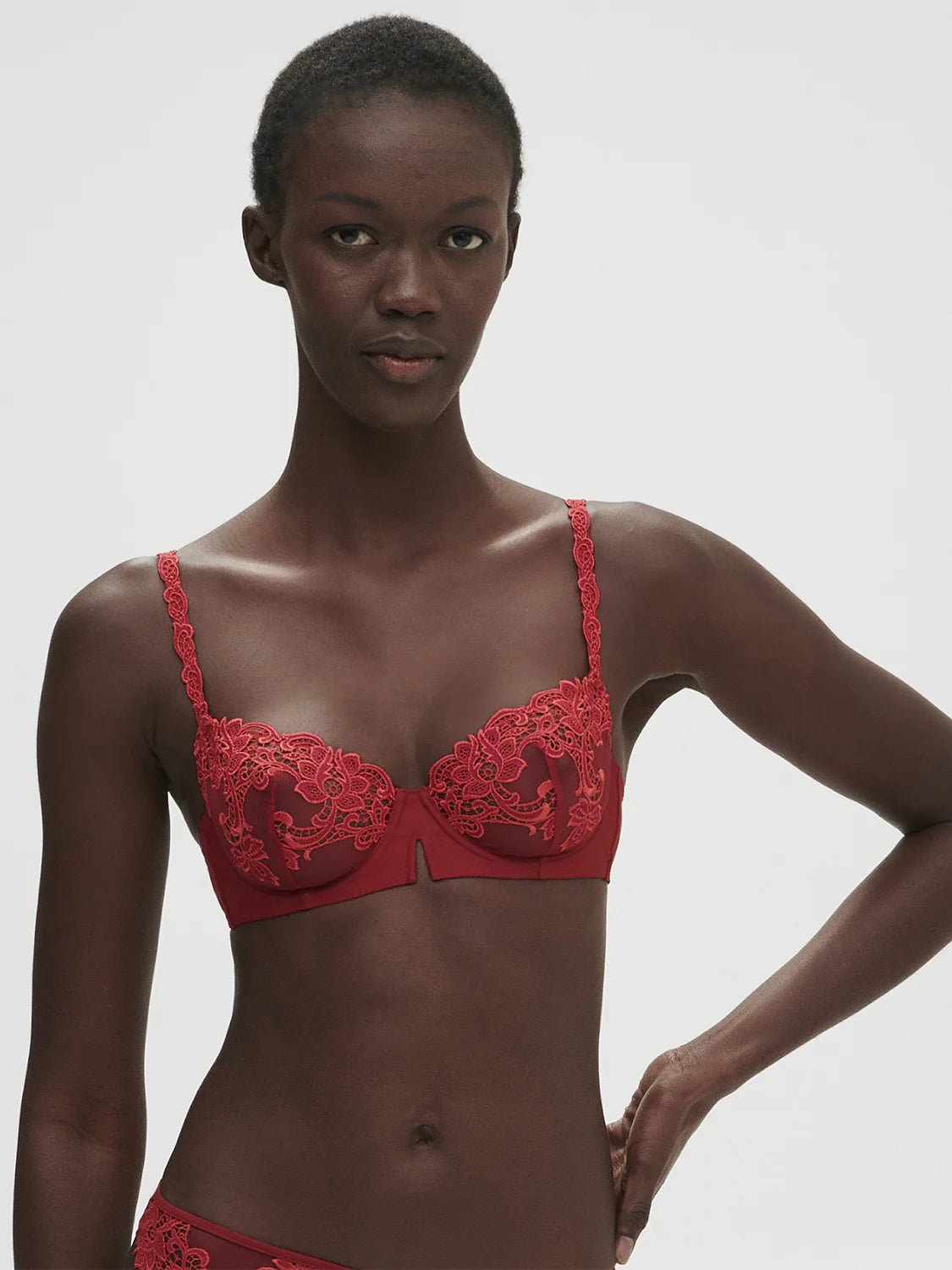 Front view of Saga Half Cup Bra Lipstick from The Foundation, showing vibrant lipstick red colour and detailed guipure lace