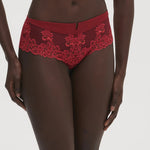 Front view of Saga Shorty Brief Lipstick by Simone Perele from The Foundation, showing rich red colour and detailed guipure lace