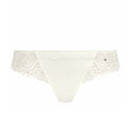 Flat lay of Simone Pérèle Wish Tanga brief in Natural, showing Brazilian-style back and delicate embroidered detail.