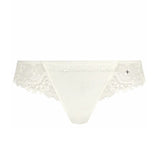 Flat lay of Simone Pérèle Wish Tanga brief in Natural, showing Brazilian-style back and delicate embroidered detail.