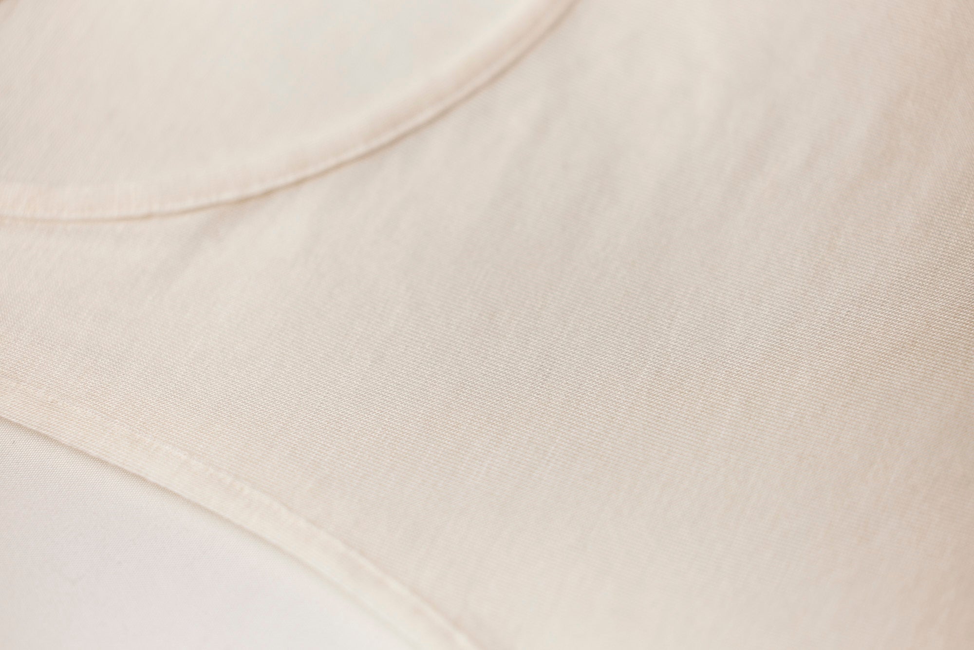 Close up The baseLINE EGI Australia modal cashmere thermal fabric in ivory bianco colour off-white