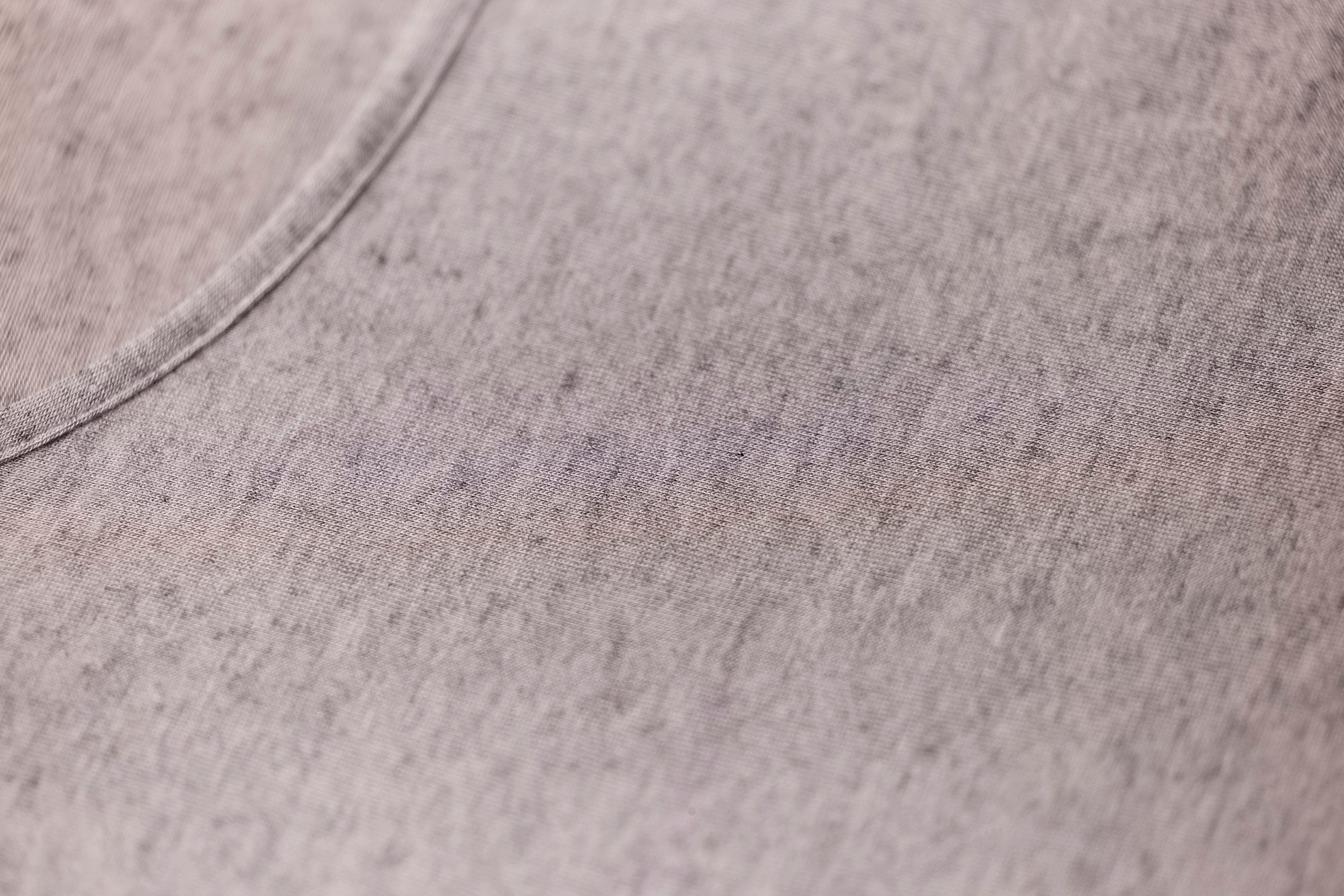 Close-up of the grey marle knit fabric of Modal Cashmere Long Sleeve Top, showing soft cashmere blend and fine Italian craftsmanship.