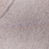 Close-up of the grey marle knit fabric of Modal Cashmere Long Sleeve Top, showing soft cashmere blend and fine Italian craftsmanship.