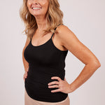 Woman wearing a black EGI modal camisole, showing front view and comfortable fit.