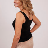 Back-angle view of black modal tank top by EGI, showing shoulder strap style and back fit.