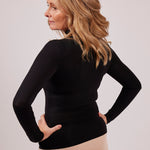 Side profile of black modal EGI polo neck top showing flattering stretch and smooth texture.