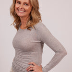Model wearing Modal Cashmere Long Sleeve Top in grey, showcasing the soft marle texture and elegant thermal fit.