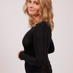 TBL Modal Cashmere Long Sleeve Top in Black with scoop neckline and lightweight Italian-made thermal fabric – available at The Foundation