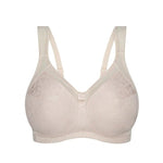 Flat lay of Fresh Powder Endless Comfort Wirefree Bra by Triumph with multi-piece cup design and light embroidery—available at The Foundation.