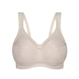 Flat lay of Fresh Powder Endless Comfort Wirefree Bra by Triumph with multi-piece cup design and light embroidery—available at The Foundation.