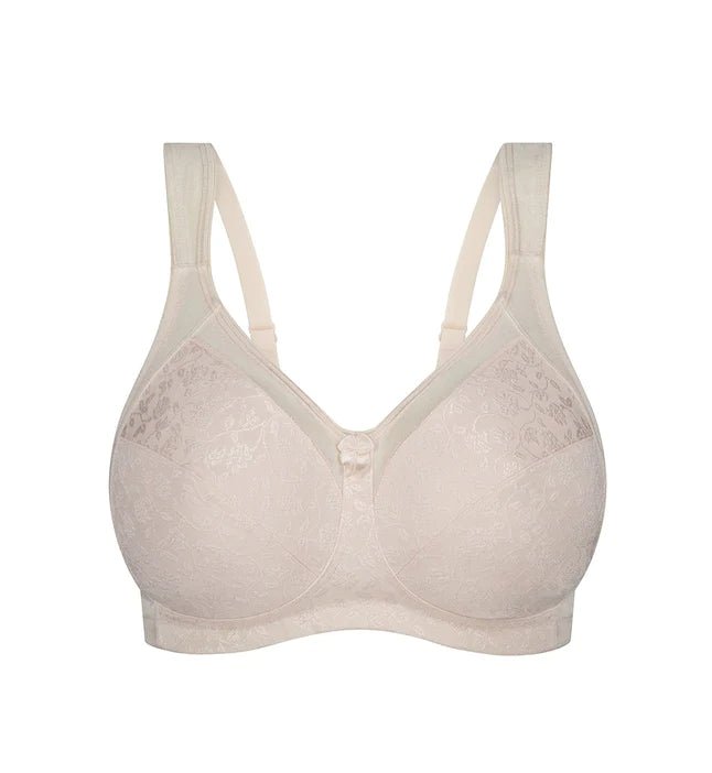 Flat lay of Fresh Powder Endless Comfort Wirefree Bra by Triumph with multi-piece cup design and light embroidery—available at The Foundation.