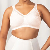 Front view of Triumph Endless Comfort Wirefree Bra in Fresh Powder with soft full cups and wide straps—available now at The Foundation.