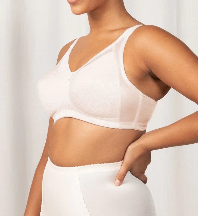 Side view of Endless Comfort Bra by Triumph in Fresh Powder showing smooth finish and wire-free structure—shop at The Foundation.