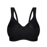 Flat lay of Triumph’s Black Endless Comfort Wirefree Bra showing soft contour and floral embroidery—exclusive to The Foundation.