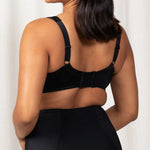 Back view of the Triumph Endless Comfort Wirefree Bra in Black with smooth finish and 4-hook closure—available at The Foundation.