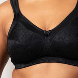 Close-up of Triumph Endless Comfort Bra in Black highlighting flower and leaf embroidery—shop The Foundation’s comfort collection.