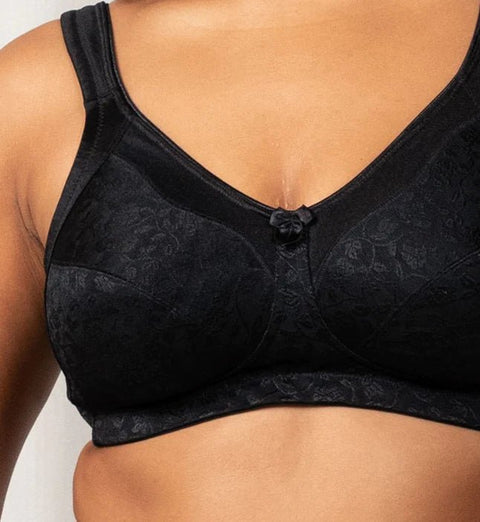 Close-up of Triumph Endless Comfort Bra in Black highlighting flower and leaf embroidery—shop The Foundation’s comfort collection.