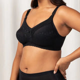Side angle of The Foundation’s black Lace Maternity Bra showing drop-down nursing cup design for easy feeding access.