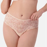 Front view of Triumph Essential Lace Maxi Brief Nude Pink on model showing sheer lace design and comfortable full coverage fit.