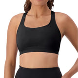 Front view of Triumph Triaction Ultra Seamfree Crop Top Black, seamless athletic bra with moisture-management, designed for all bust sizes.