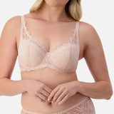 Front view of Triumph Essential Lace Balconette Bra WHP Nude Pink on model showing supportive lace cups and elegant straps.