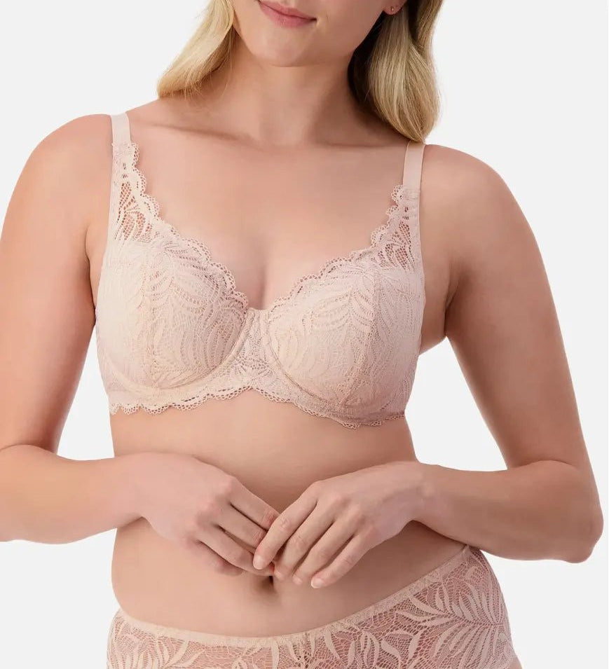 Front view of Triumph Essential Lace Balconette Bra WHP Nude Pink on model showing supportive lace cups and elegant straps.