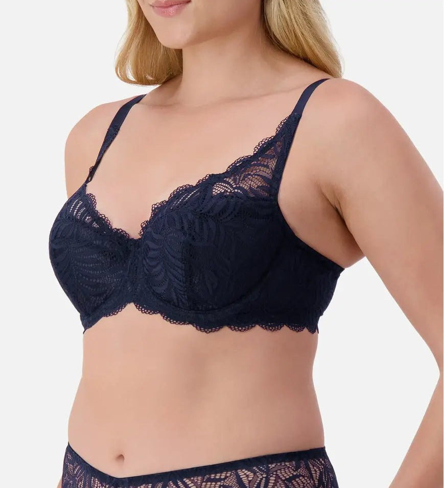 Side angle of Triumph Essential Lace Balconette Bra WHP Navy Blue on model showing lightly padded cups and elegant lace detail.
