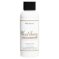 100ml bottle of Bon Savvy Wool & Cashmere Laundry Liquid with black cap, designed for delicate wool, cashmere, and knitwear care.