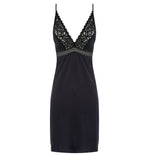 Flat lay of Wacoal Raffine Chemise Black laid flat with delicate scalloped lace and smooth, breathable fabric.