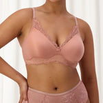 Close up of The Foundation’s Amourette Charm Non Wire Moulded Bra in Rust, showing the flattering shape and lace detailing.
