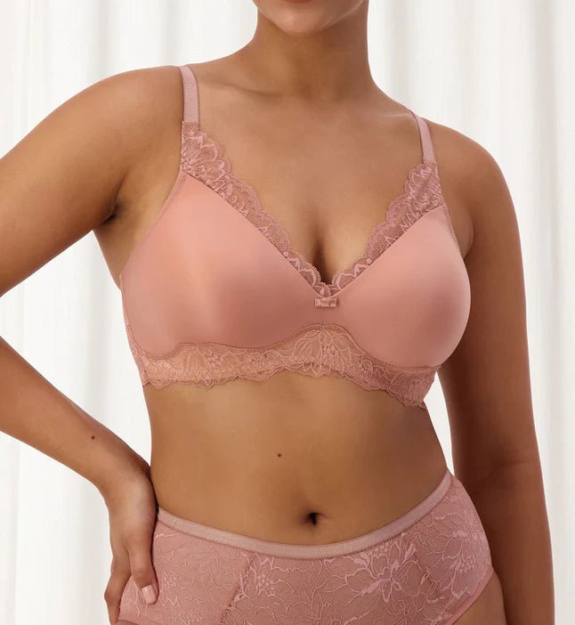 Close up of The Foundation’s Amourette Charm Non Wire Moulded Bra in Rust, showing the flattering shape and lace detailing.