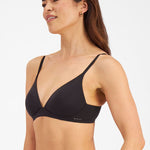 Full-body image of model in Berlei’s Understate Wirefree Bra in Black—available at The Foundation for wire-free, all-day support.