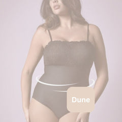 Model in Janira Body Lace Perfect Curves bodysuit in Dune shade, showcasing seamless torso smoothing and stretch lace bust.