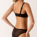 Back of Melody Bikini Brief in black featuring sheer tulle for a soft, seamless finish.