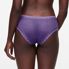 Model wearing Chantelle Day To Night Shorty Brief in Veronica, featuring vivid purple lace, soft mesh lining, and a comfortable hipster silhouette. back view