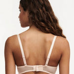 Model wearing Chantelle Day to Night Half Cup Bra in Golden Beige, featuring refined lace, demi cups, and soft adjustable straps for a lifted fit. back view