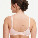Model in Chantelle C Magnifique Moulded Bra in Rose from The Foundation, showcasing full-coverage cups and supportive smoothing mesh back. back view