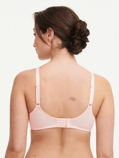 Model in Chantelle C Magnifique Moulded Bra in Rose from The Foundation, showcasing full-coverage cups and supportive smoothing mesh back. back view