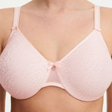 Model in Chantelle C Magnifique Moulded Bra in Rose from The Foundation, showcasing full-coverage cups and supportive smoothing mesh back. close up view