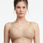 Front view of Chantelle C Magnifique Non Wire Bra in Nude featuring floral jacquard cups and adjustable straps.